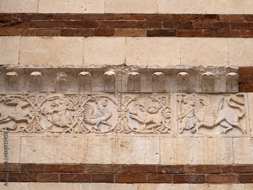 Verona dome cathedral church exterior sculptures detail. Romanesque sculpture attributed to the workshop of Veronese sculptor Brioloto