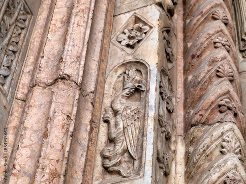 Verona dome cathedral church exterior sculptures detail. Romanesque sculpture attributed to the workshop of Veronese sculptor Brioloto photo