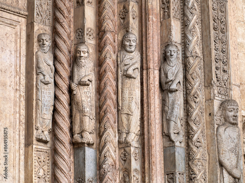 Verona dome cathedral church exterior sculptures detail. Romanesque sculpture attributed to the workshop of Veronese sculptor Brioloto photo