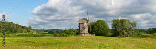 Cuadro en lienzo An old windmill in a field