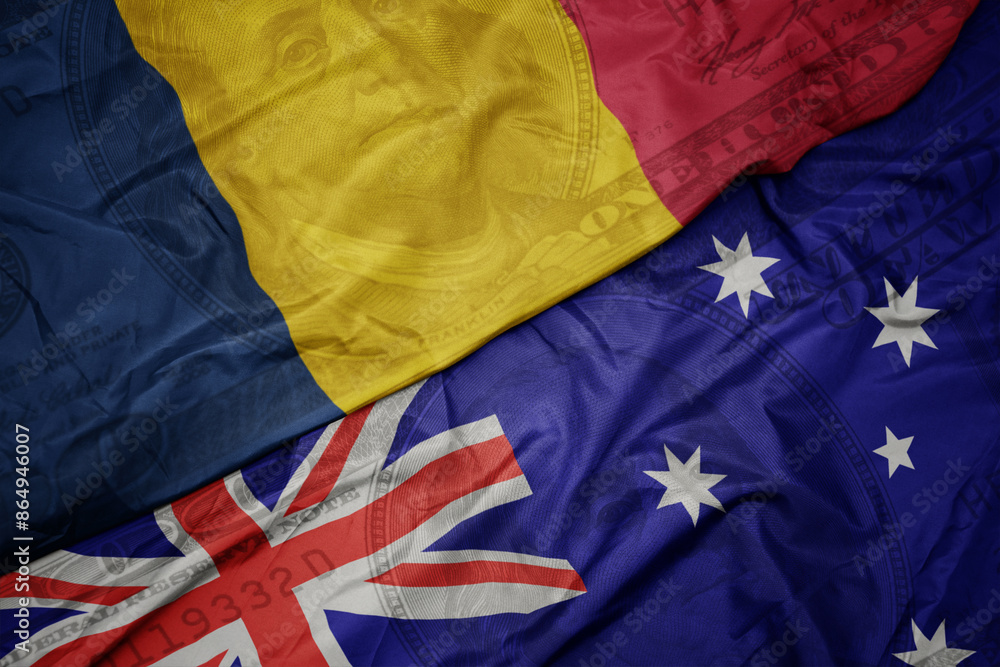 waving colorful flag of chad and national flag of australia on the dollar money background. finance concept. waving colorful flag of chad and national flag of australia on the dollar money background. finance concept.
