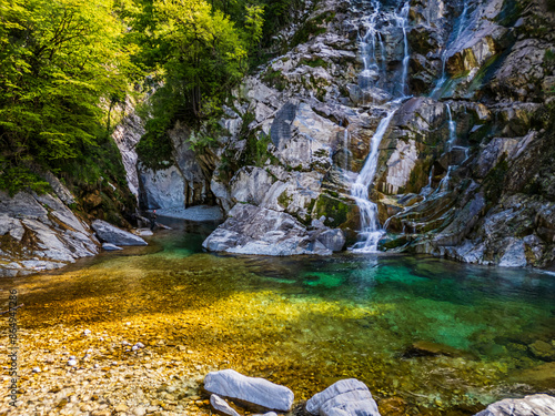 Waterfall and dam in the Julian Prealps. Crosis, pearl of Tarcento. Nature and engineering. photo