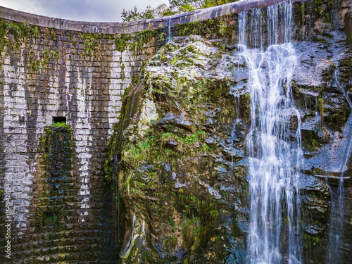 Waterfall and dam in the Julian Prealps. Crosis, pearl of Tarcento. Nature and engineering. photo