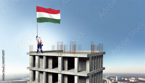 A construction worker proudly raises the Hungary flag atop a new building, symbolizing progress and the construction of new real estate