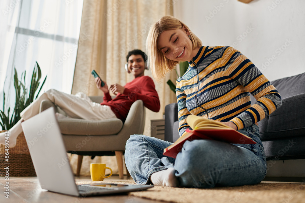 A happy multicultural couple spends time together in a modern apartment. A happy multicultural couple spends time together in a modern apartment.