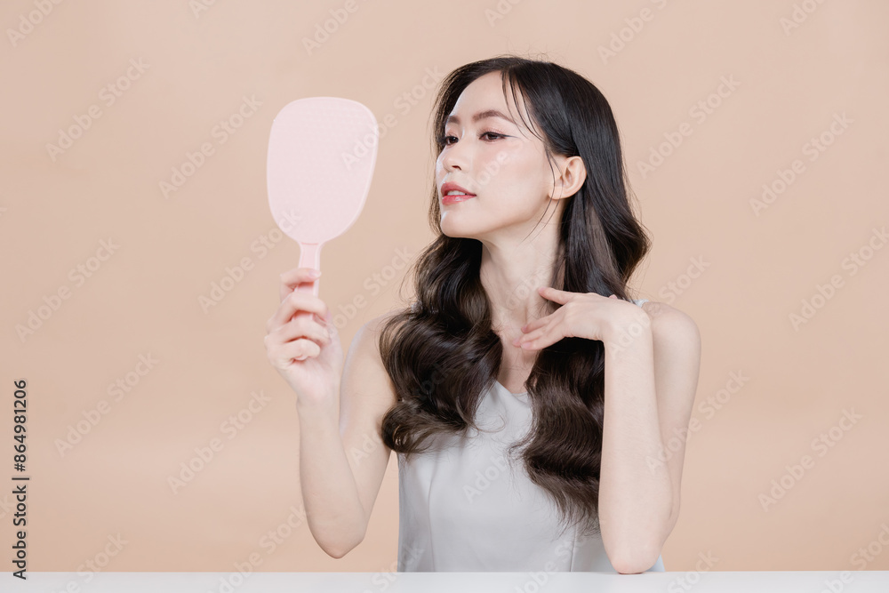 young asian woman with clean fresh skin on beige background, Cosmetics, Face care, Facial treatment, Cosmetology, beauty and spa, Asian women portrait. woman with make up brush cosmetic Beautiful young asian woman with clean fresh skin on beige background, Cosmetics, Face care, Facial treatment, Cosmetology, beauty and spa, Asian women portrait. woman with make up brush cosmetic Beautiful