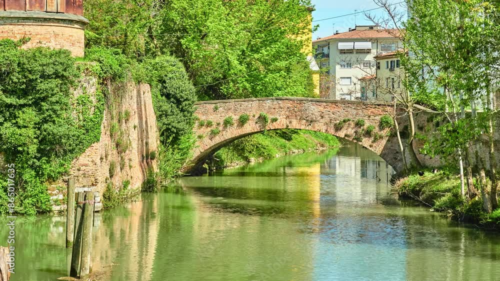 PADUA, ITALY - APRIL 17 2018: Stone bridge near Astronomical Observatory, Museum Of The Astronomical Observatory Of Padua, Italy. University of Padua