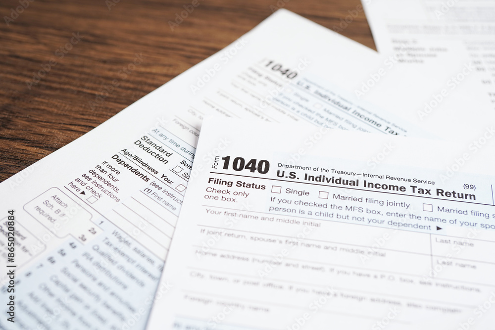 Tax form 1040 U.S. Individual Income Tax Return, business finance concept. Tax form 1040 U.S. Individual Income Tax Return, business finance concept.