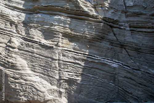 Santorini - Greece - May 17, 2024: Rock formation at Cape Columbo Beach, Santorini, Cycladic Islands, Greece.