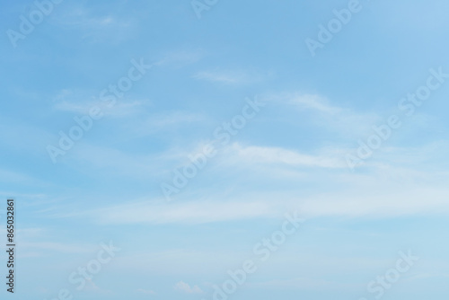 Fluffy blue sky background and white clouds soft focus, and copy space