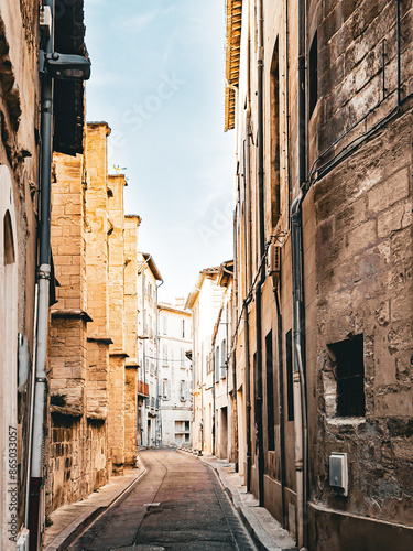 Street view of old village Avignon in France photo