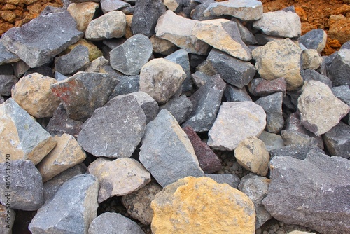 Piles of gravel limestone rock on construction site