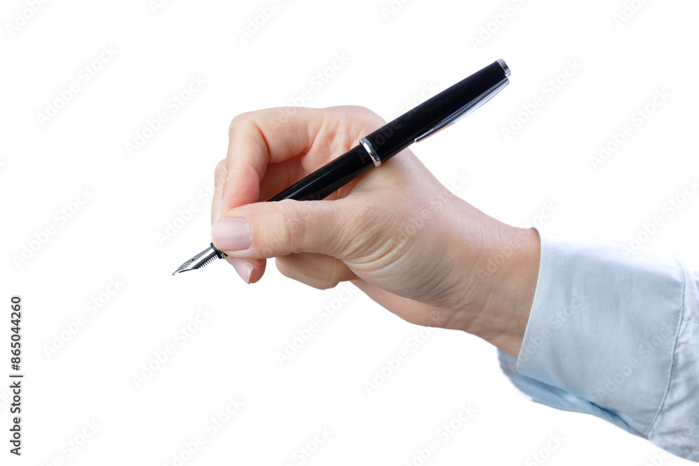 Woman's hand writing with a fountain pen Woman's hand writing with a fountain pen