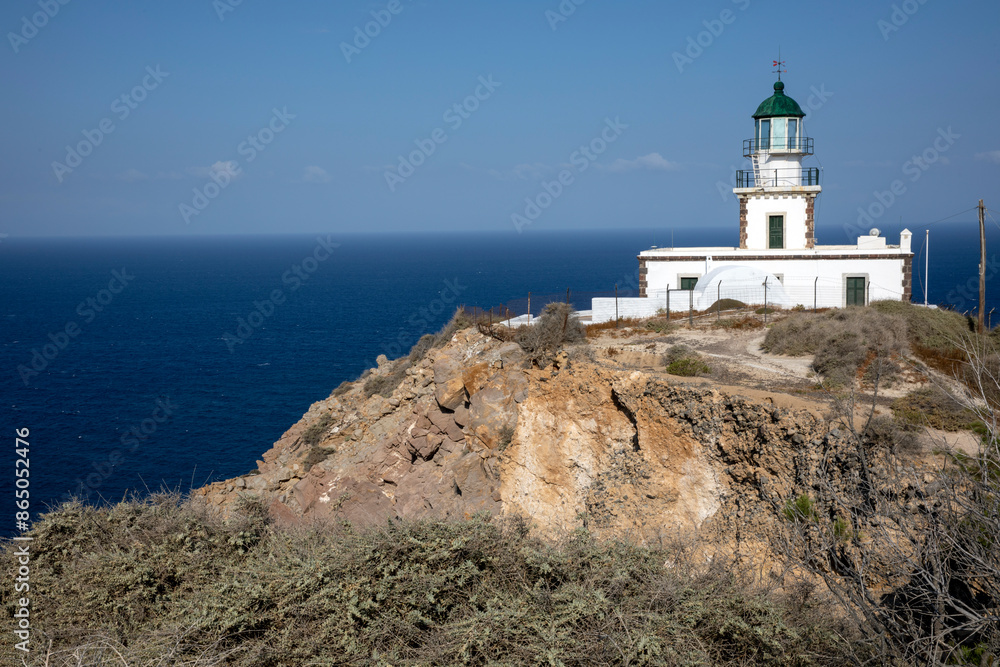 Santorini - Greece - May 17, 2024: The Lighthouse of Akrotiri, Santorini, Cycladic Islands, Greece. Santorini - Greece - May 17, 2024: The Lighthouse of Akrotiri, Santorini, Cycladic Islands, Greece.