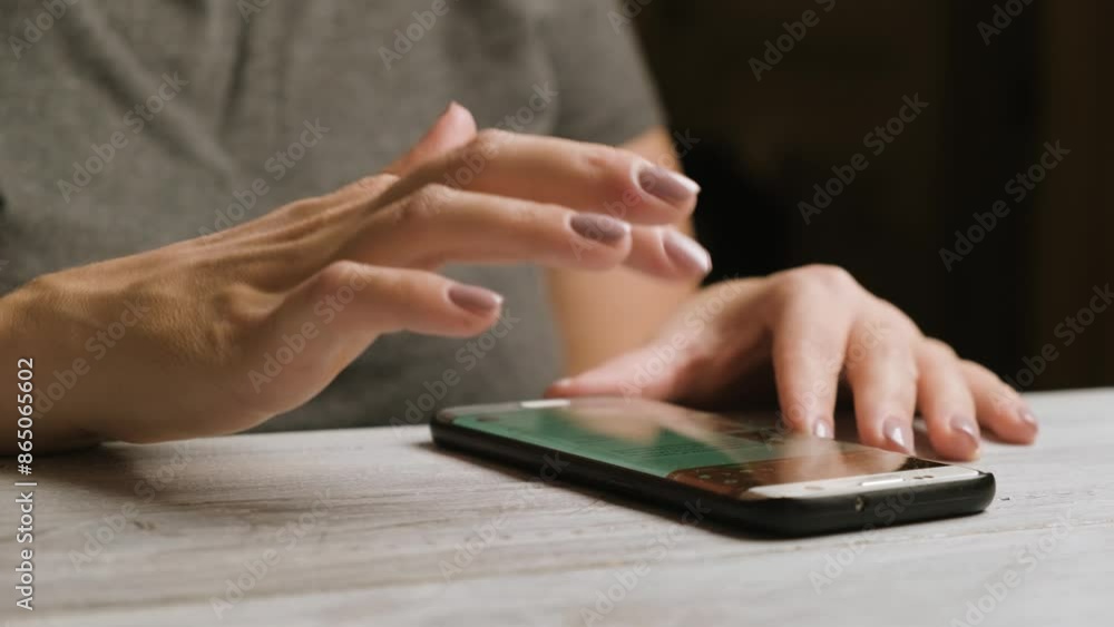 Hands of woman using smartphone at home texting or typing on mobile. Communication, online shopping, chat, social, networking. Hands of woman using smartphone at home texting or typing on mobile. Communication, online shopping, chat, social, networking.