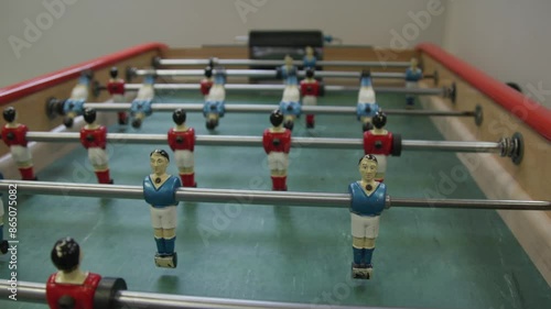 foosball table with player spinning 