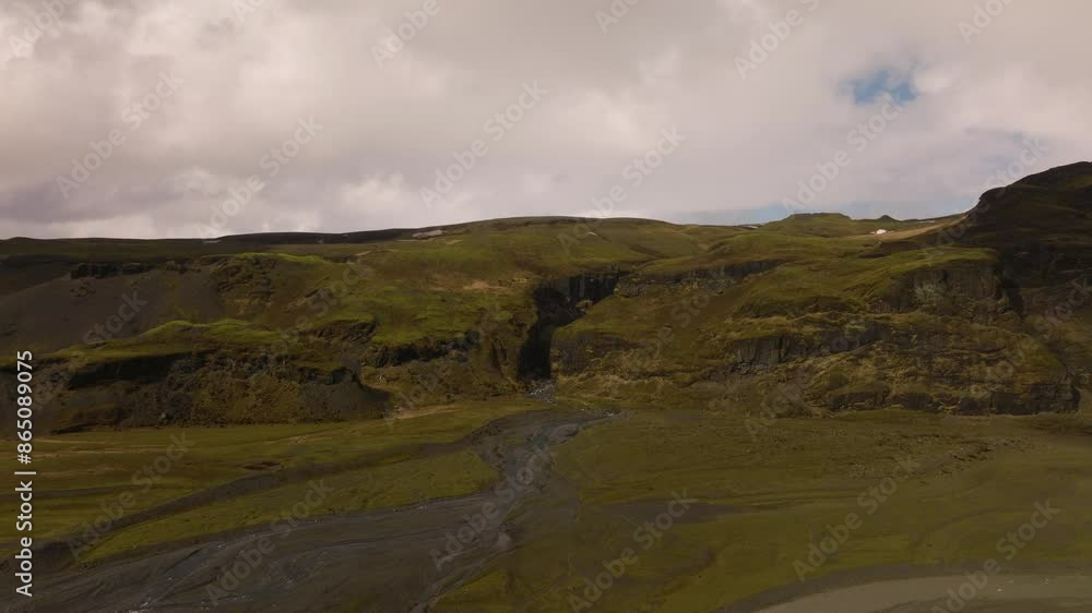 Aerial revealing shot over small glacier rivers in Sólheimajökul, Iceland. Aerial revealing shot over small glacier rivers in Sólheimajökul, Iceland.