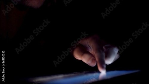 Nighttime Tablet Use: Man Browsing Digital Tablet - 4K Ultra HD Video
