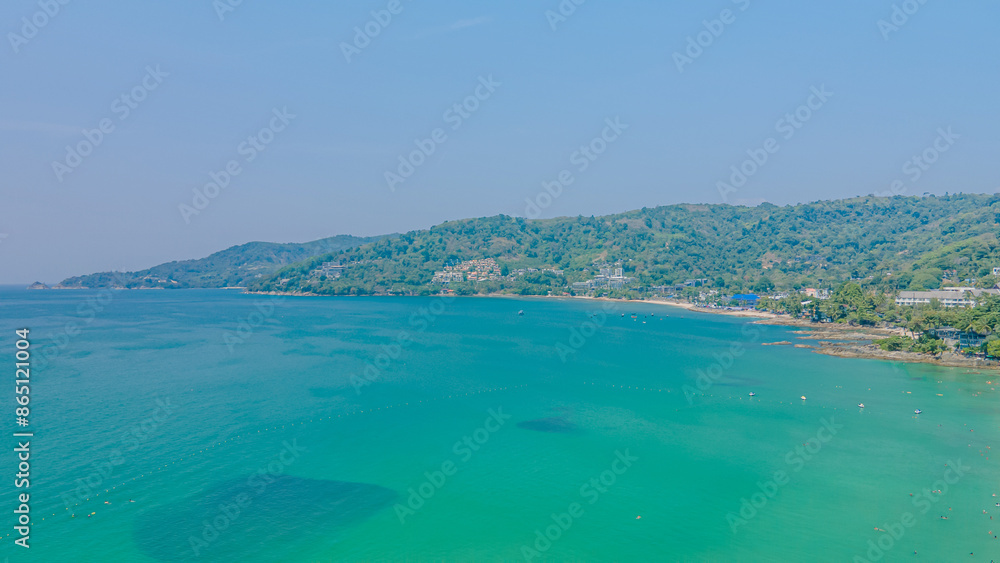 Fototapeta premium Patong Beach Popular places. afternoon light sky and blue ocean are on the back of white Phuket sea is the one of landmarks on Phuket island Thailand.