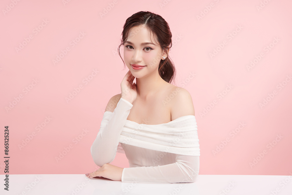 Beautiful young asian woman with clean fresh skin on pink background, Face care, Facial treatment, Cosmetology, beauty and spa, Asian women portrait. Beautiful young asian woman with clean fresh skin on pink background, Face care, Facial treatment, Cosmetology, beauty and spa, Asian women portrait.