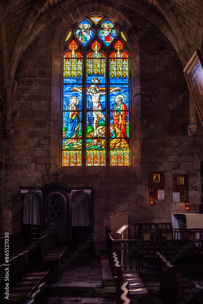 Fototapeta premium Stained Glass Window in Collegiale Saint Aubin, Guerande, France