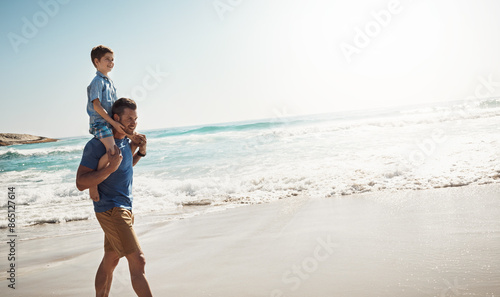 Bild auf Leinwand Dad, ocean and boy child on shoulders for walk, vacation and sunshine to relax with care, love or bonding