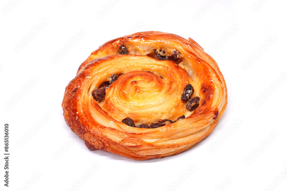 Pain aux raisins isolate on white, also called escargot or pain russe, is a spiral pastry often eaten for breakfast in France. Its names translate as Pain aux raisins isolate on white, also called escargot or pain russe, is a spiral pastry often eaten for breakfast in France. Its names translate as