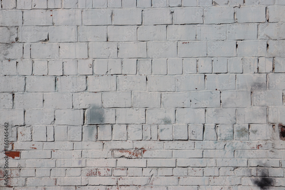 Fototapeta premium White brick wall and a beautiful window. Brick wall texture.