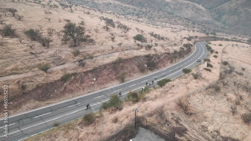 high-speed cycling along the main avenue in the municipality of Barnechea, Chile photo