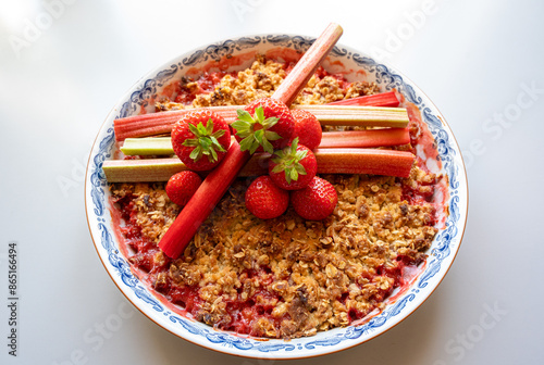 Fresh fruits on baked fruit pie with crumb dough