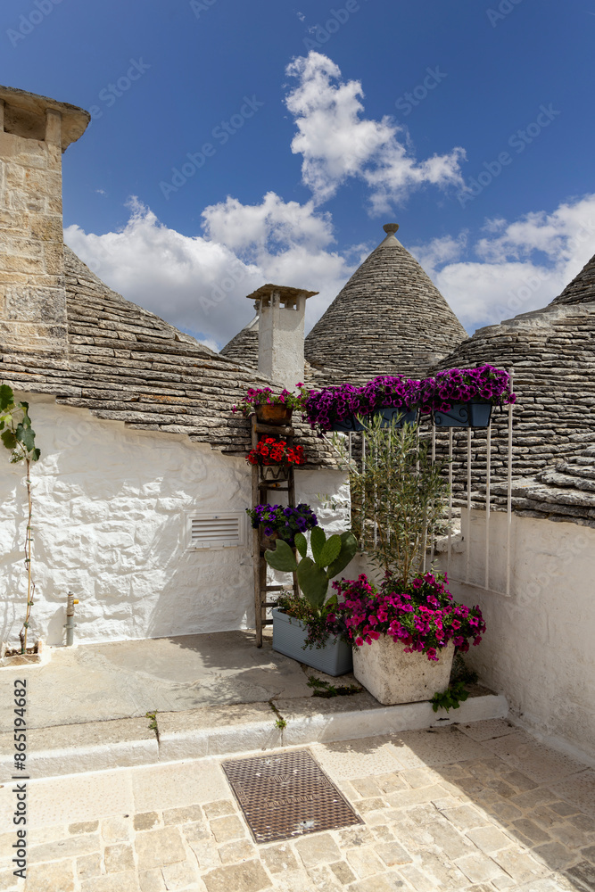 Trulli houses, traditional, unique Apulian dry stone hut with a conical roof, Alberobello, Italy