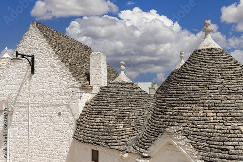 Obraz na płótnie Trulli houses, traditional, unique Apulian dry stone hut with a conical roof, Alberobello, Italy w salonie