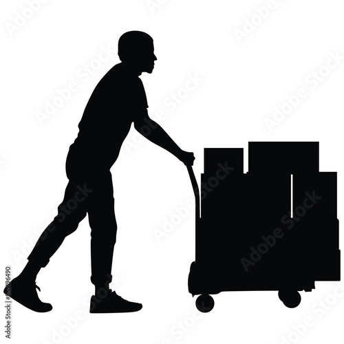Man working at a warehouse with boxes.Logistic and Delivery.Worker pushing a hand truck.Courier carries a cart with boxe.