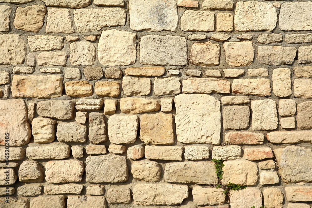 Antique natural stonewall. pattern of modern style design decorative uneven cracked real stone wall surface with cement Antique natural stonewall. pattern of modern style design decorative uneven cracked real stone wall surface with cement