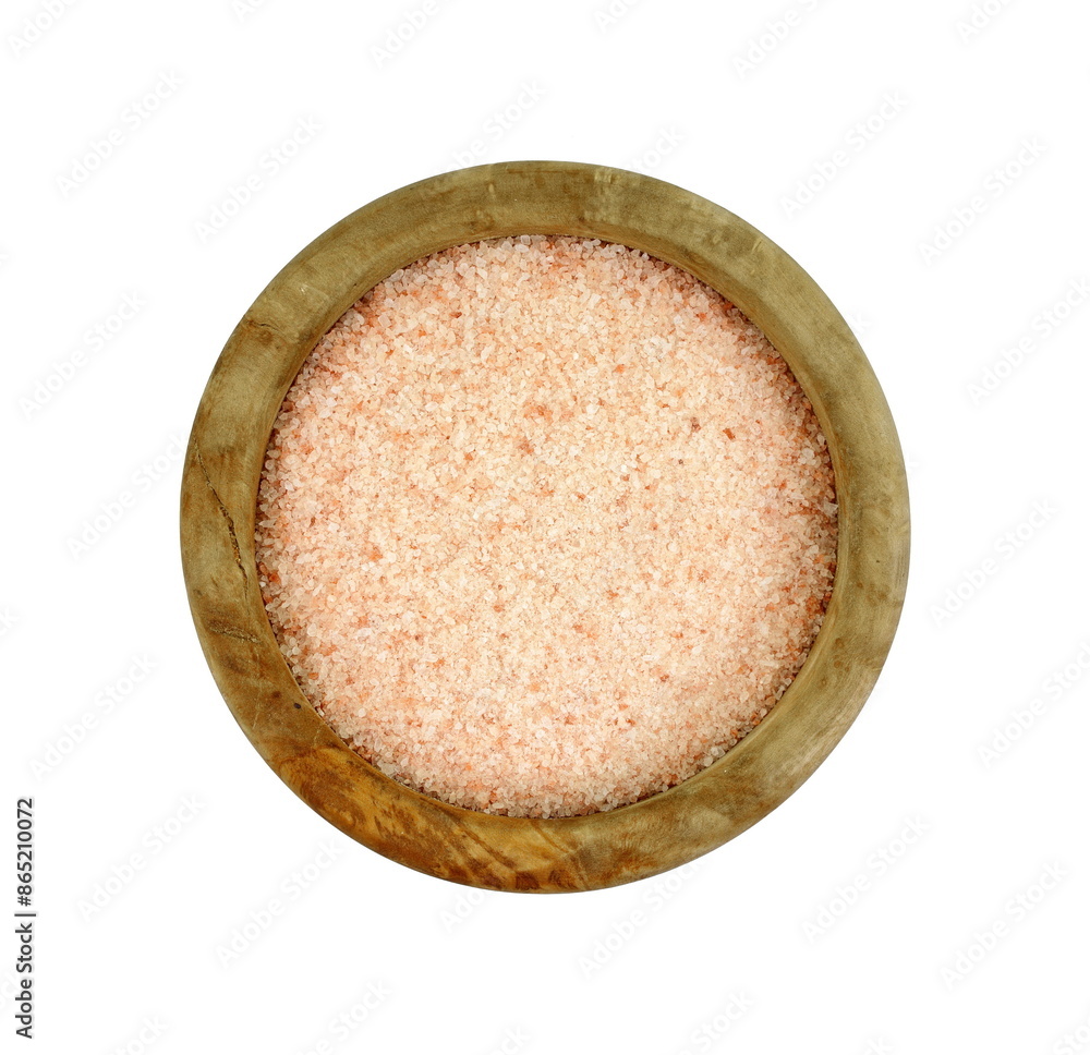 Himalayan salt in a wooden bowl on white background Himalayan salt in a wooden bowl on white background