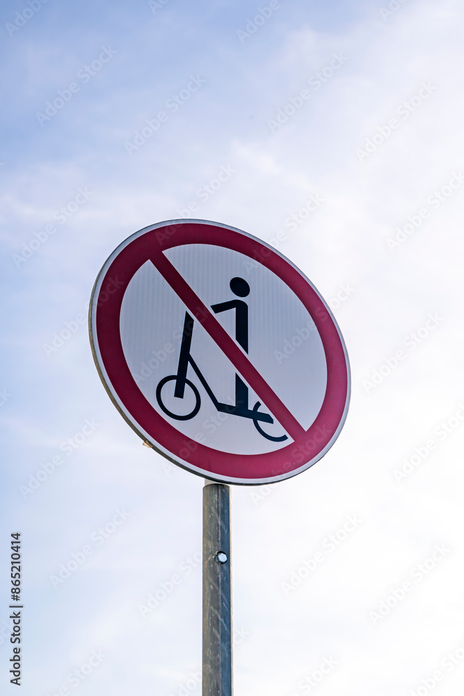 Scooter ban. Sign prohibiting movement on a scooter on a city street Scooter ban. Sign prohibiting movement on a scooter on a city street