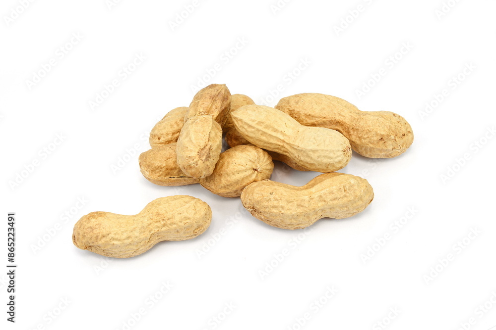 Organic peanuts in shell, isolated on white background. Raw peanuts on a white background. Unshelled peanuts. Organic peanuts in shell, isolated on white background. Raw peanuts on a white background. Unshelled peanuts.