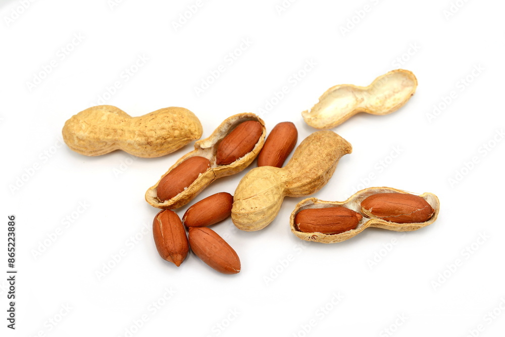 Raw peanuts top view isolated on white background (shelled, husk, whole, halves) Raw peanuts top view isolated on white background (shelled, husk, whole, halves)