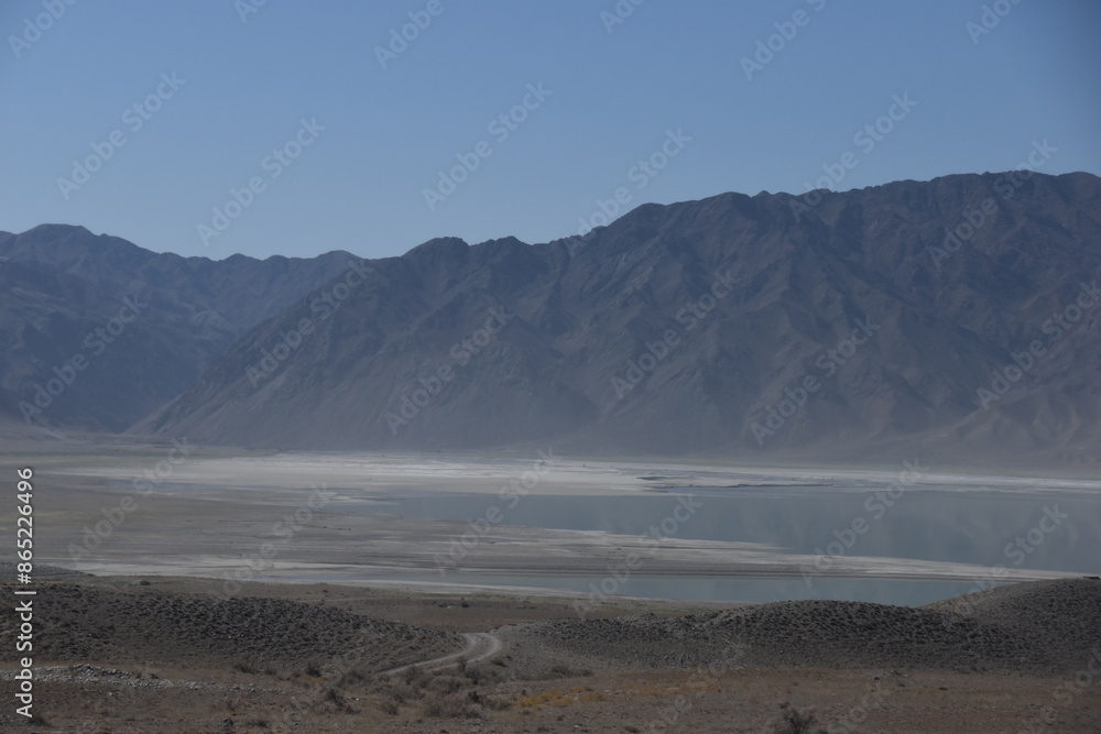 Stunning desert lake in the dry mountain landscape of Kazakhstan, Central Asia Stunning desert lake in the dry mountain landscape of Kazakhstan, Central Asia