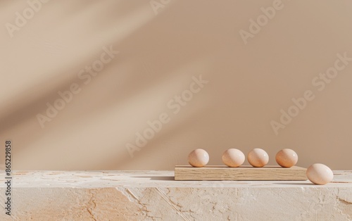 Minimalist Wooden Podium with Soft Beige Eggs Against a Vibrant Brown Textured Background in Bright Diffused Lighting photo