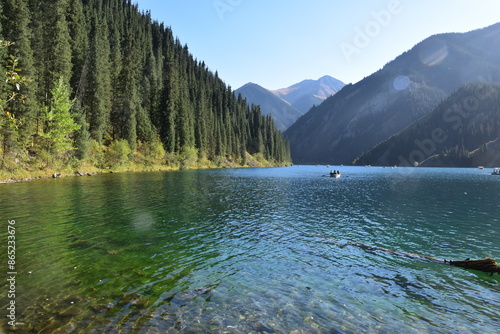Fotografie The beatiful Turquoise mountain Lake Issyk Kul close to Almaty in Kazakhstan