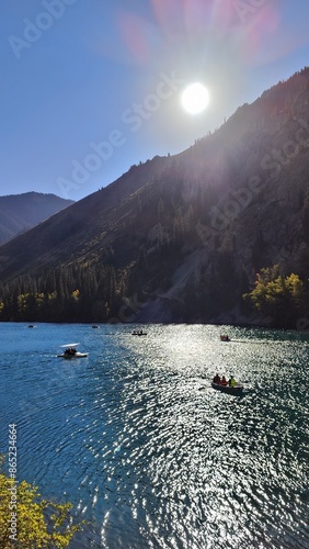 The beatiful Turquoise mountain Lake Issyk Kul close to Almaty in Kazakhstan photo