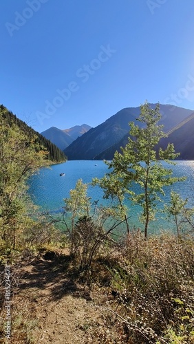 The beatiful Turquoise mountain Lake Issyk Kul close to Almaty in Kazakhstan photo