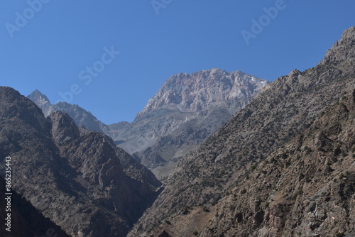 The stunning turquoise lake Iskanderkul and surrounding mountains and valleys in Tajikistan, Central Asia