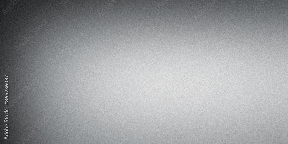 Grainy texture gradient background fading from dark to light gray Grainy texture gradient background fading from dark to light gray