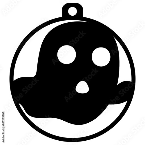 A black and white image of a circular pendant or ornament with a simple cartoon-like face or mask design, consisting of two eyes and a smiling mouth