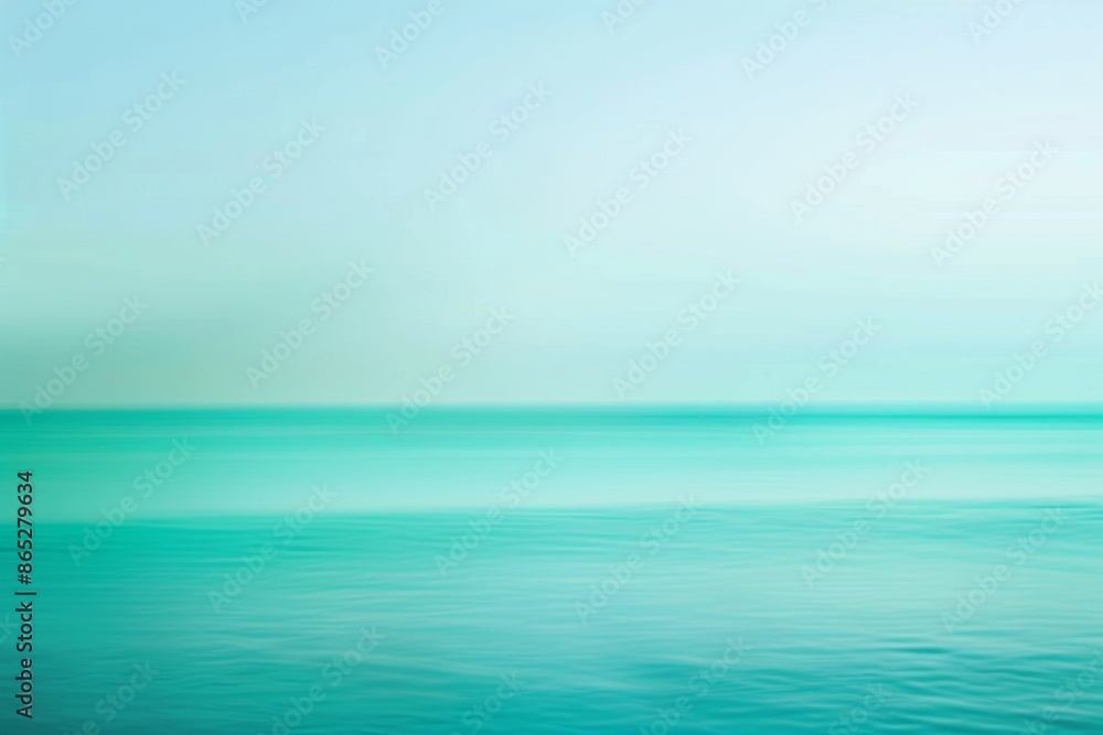 Obraz premium Minimalist seascape featuring calm ocean water merging with the pastel colors of the sky, creating a serene and tranquil atmosphere