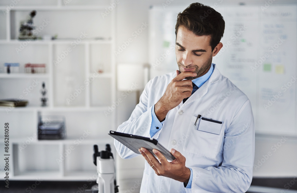 Thinking, scientist and man with tablet in lab for research, data analytics and reading experiment test results. Male doctor, digital and online report, information and manufacturing vaccine solution Thinking, scientist and man with tablet in lab for research, data analytics and reading experiment test results. Male doctor, digital and online report, information and manufacturing vaccine solution