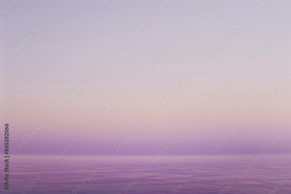 The calm water reflects soft pastel hues of purple, pink, and blue as the sun sets, creating a serene and tranquil scene in the evening twilight sky The calm water reflects soft pastel hues of purple, pink, and blue as the sun sets, creating a serene and tranquil scene in the evening twilight sky