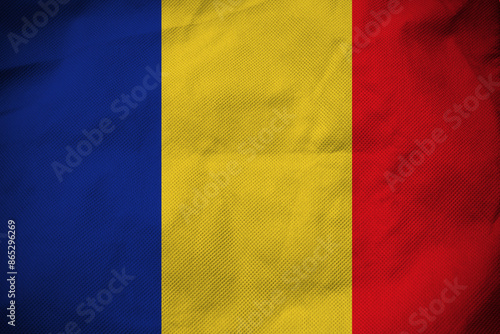 Obraz na plátně Romania nation flag on crumpled fabric background , country flag
